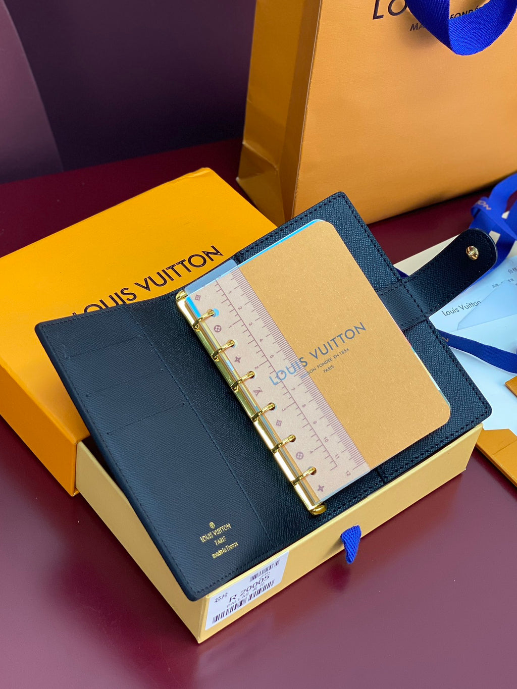 Blue Louis Vuitton small bag agenda cover with gold rings and inner pocket