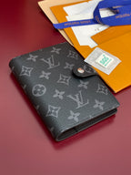 Louis Vuitton small bag, dark monogram cardholder with button tab and folded pages