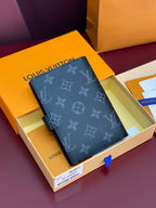 Louis Vuitton small bag, dark monogram cover with clasp and embossed pattern