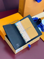 Louis Vuitton small bag opened, showing ruler organizer and interior card pockets