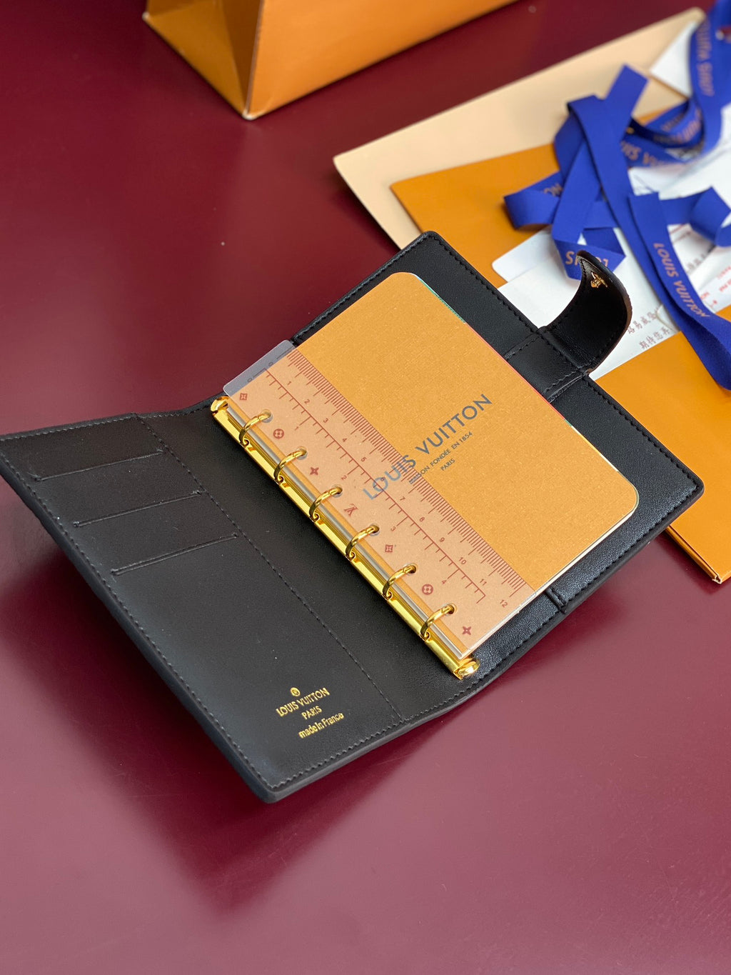 Small Louis Vuitton leather organizer, open pockets and ruler, blue