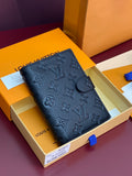 Small Louis Vuitton monogram leather wallet with zip pocket, dark blue