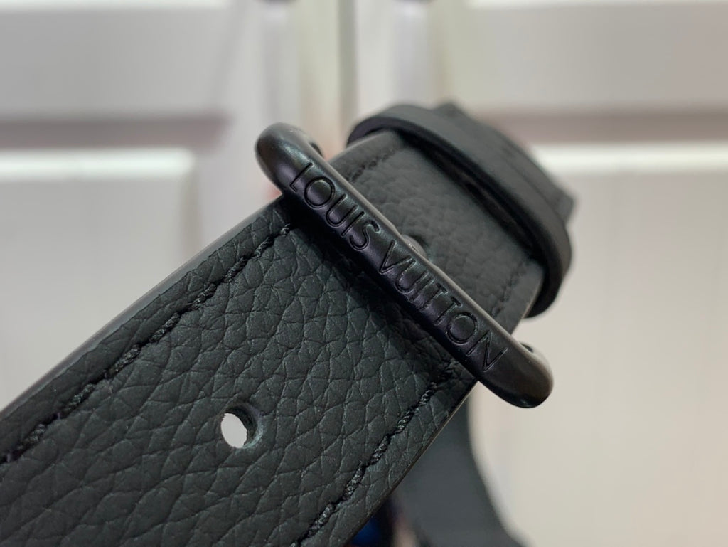 Louis Vuitton leather strap end with embossed logo plate
