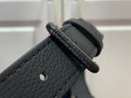 Louis Vuitton leather strap end with embossed logo plate