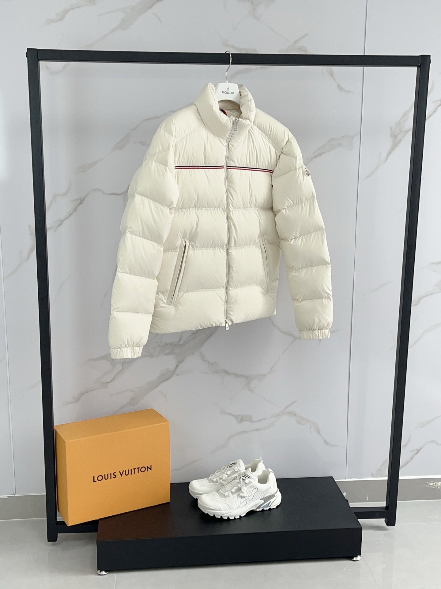 Moncler cream puffer jacket, stand collar and red stripe detail on zip