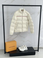 Moncler cream puffer jacket with stand collar and horizontal quilting