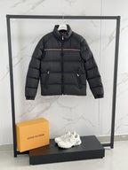 Moncler puffer jacket, black, red stripe detail and side zip pockets