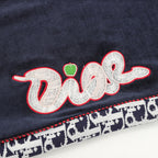 Navy pants with embroidered multicolor "Dior" script logo on the leg