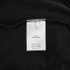Inside label on black cotton pants, Made in Italy