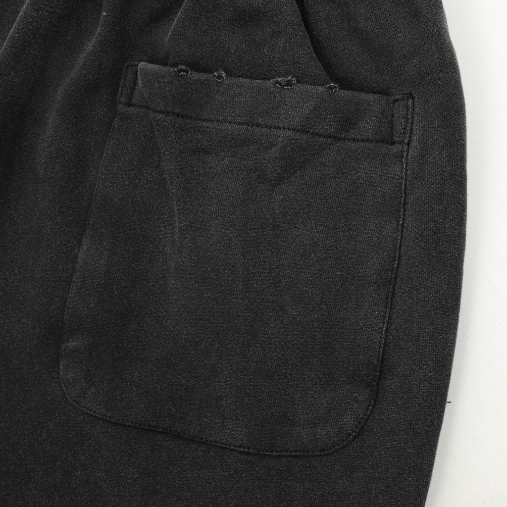 Black pants with curved side pocket detail