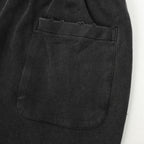 Black pants with curved side pocket detail
