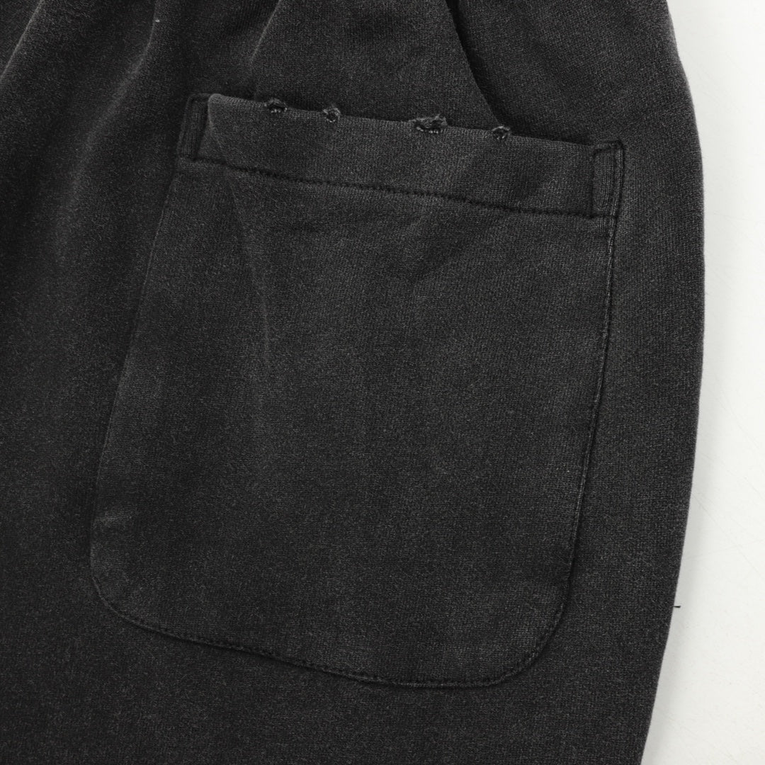 Black pants with curved side pocket detail