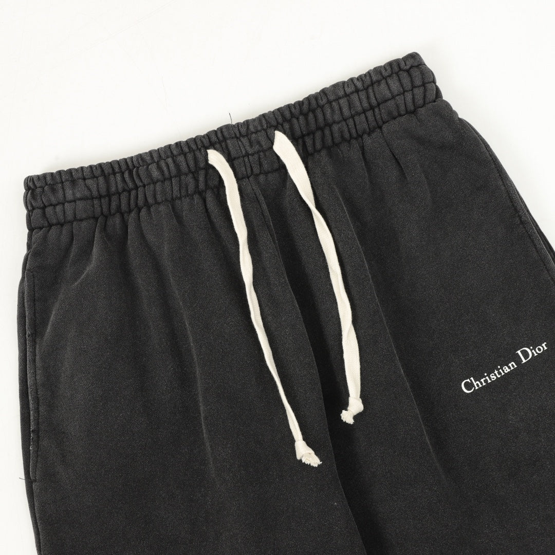 Black jogger waistband with drawstring cords and Christian Dior logo