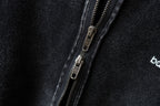 Dark hoodie zipper and metal pull detail
