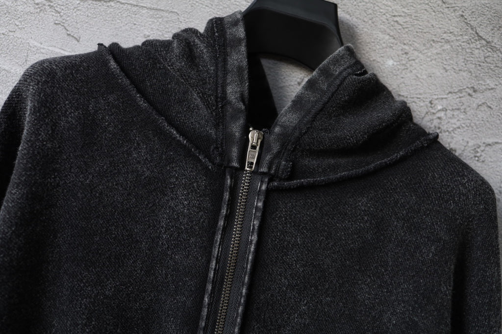 Dark zip hoodie close-up: high hood and metal zipper