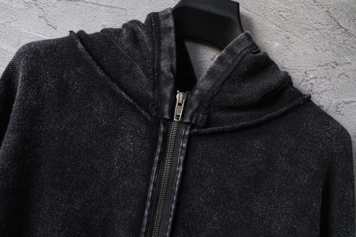 Dark zip hoodie close-up: high hood and metal zipper