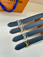 Louis Vuitton belt straps, dark navy with gold LV logo plaques across the straps.