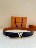 Leather belt with dark navy strap, tan lining, and gold LV buckle