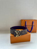 Louis Vuitton belt side view, dark monogram strap and gold LV buckle with purple edge.