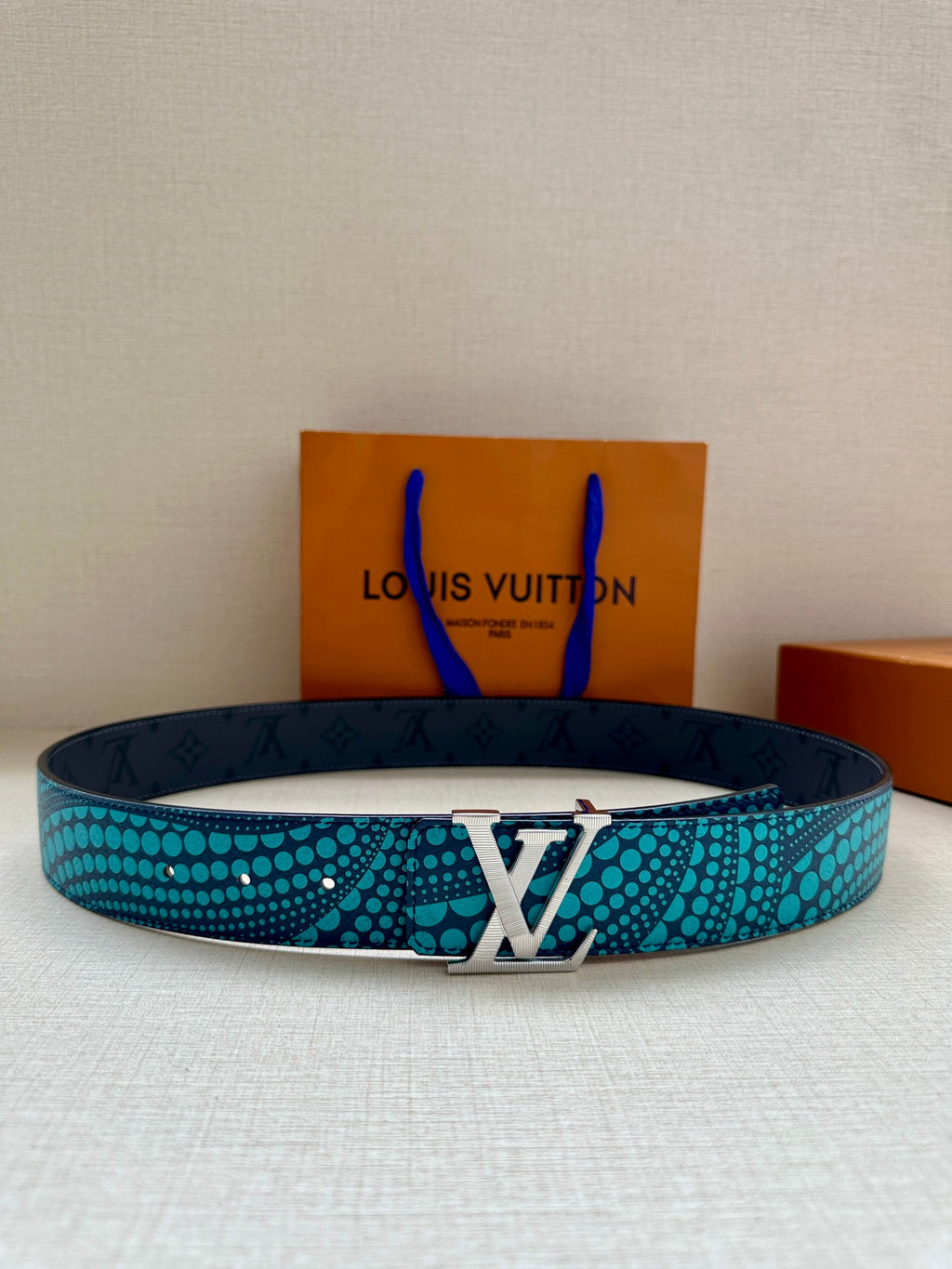 Louis Vuitton belt, turquoise with blue dot pattern and silver LV buckle