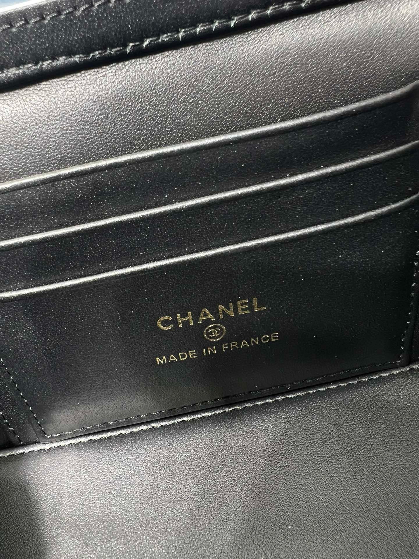 Chanel bag interior label reading 'CHANEL MADE IN FRANCE' on dark leather