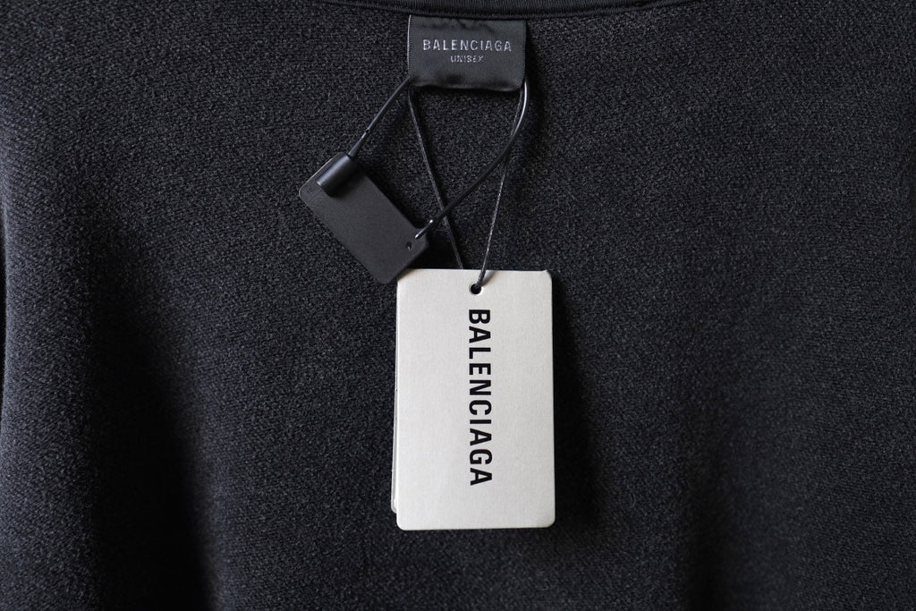 Balenciaga black crew sweatshirt neck label with attached price tags