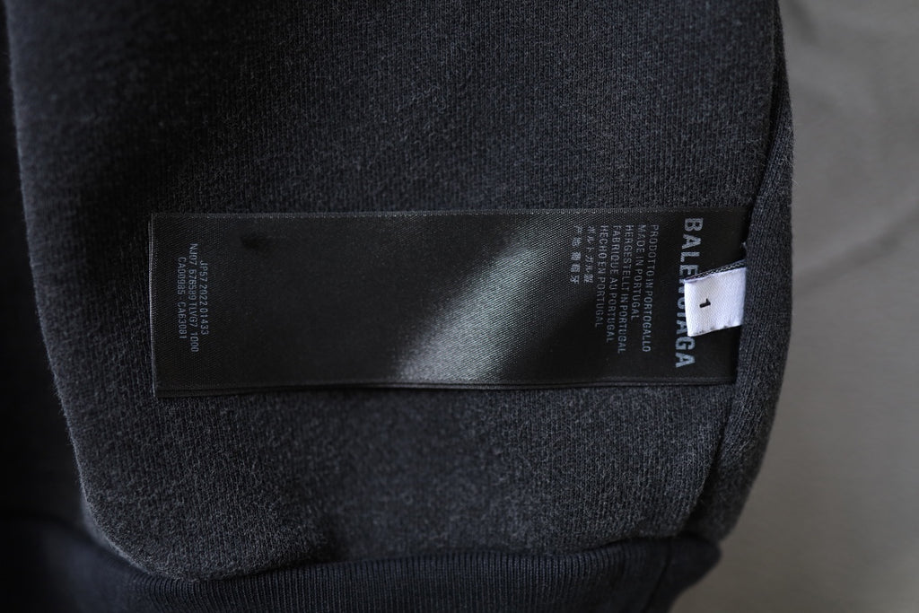 Balenciaga black sweatshirt interior hem label and care tag