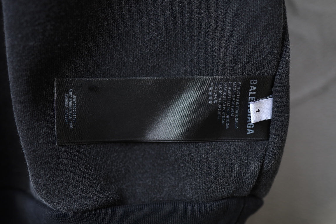 Balenciaga black sweatshirt interior hem label and care tag