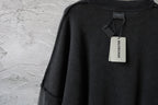Balenciaga black long-sleeve sweatshirt with hanging neck tag