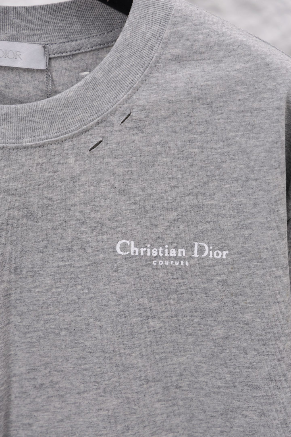 Dior long-sleeve crewneck top in heather gray with chest “Christian Dior” logo