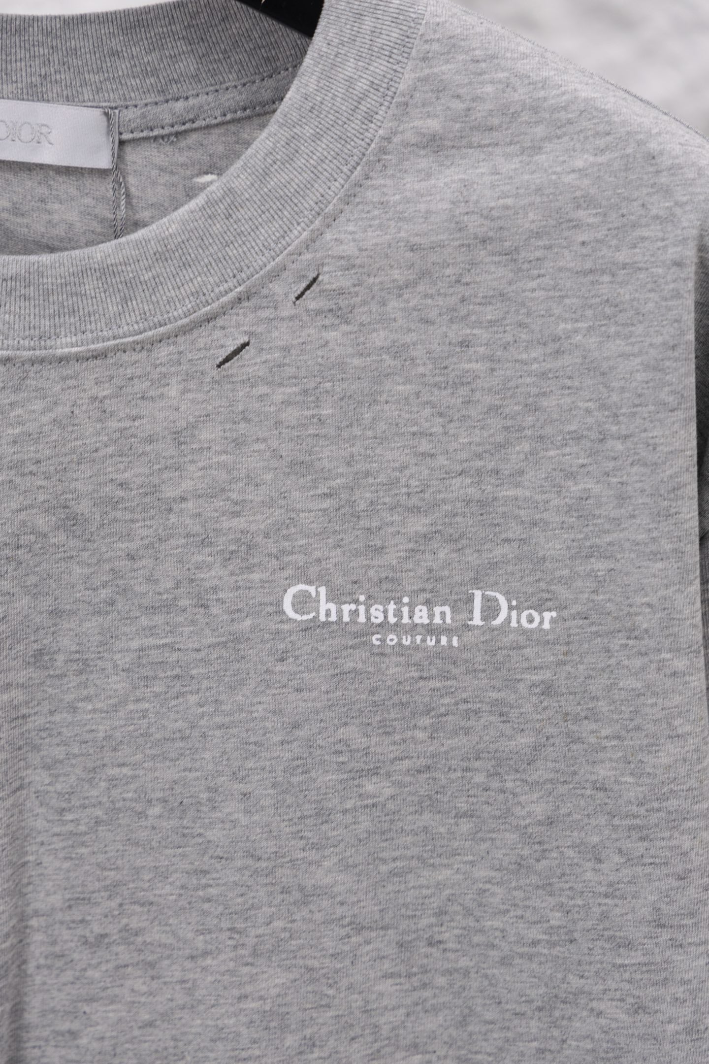 Dior long-sleeve crewneck top in heather gray with chest “Christian Dior” logo