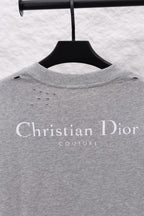 Dior long-sleeve crewneck top in heather gray with large “Christian Dior COUTURE” logo