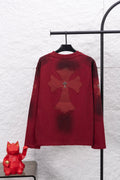 Red long-sleeve shirt with large embroidered cross on back