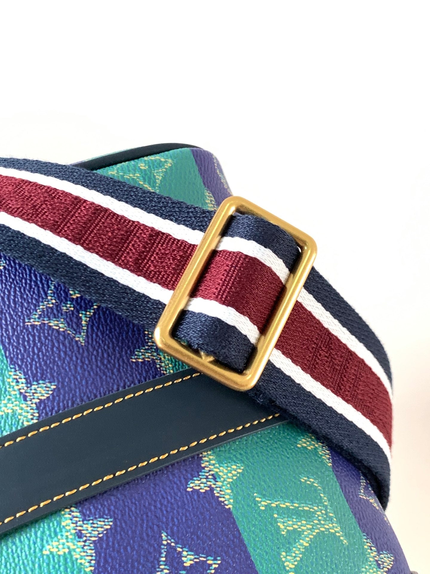Louis Vuitton multicolor shoulder strap with gold buckle and striped webbing