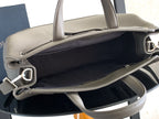 Dior men’s light gray leather bag open top with interior lining and side strap rings