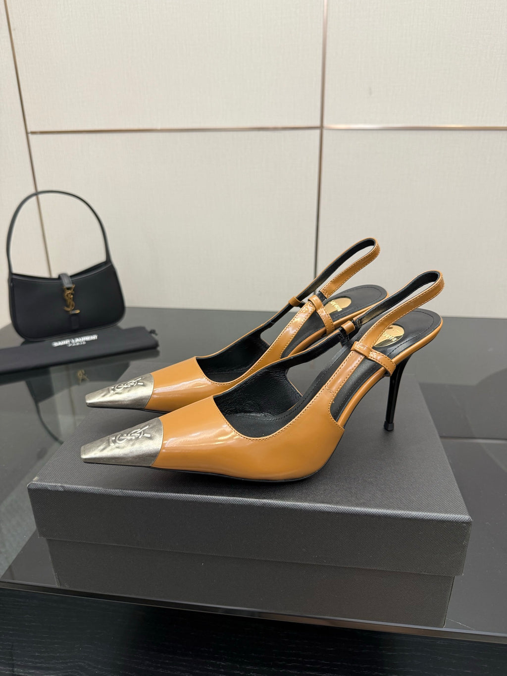 YSL womens slingback pumps in tan and black with silver toe and high heel