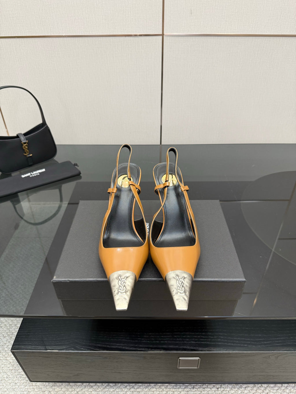 YSL womens heels with tan upper, black slingback, and silver pointed toe caps