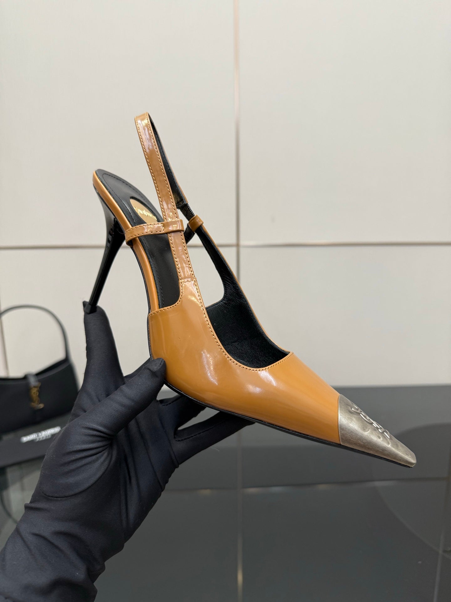 YSL womens tan and black heeled slingbacks with silver toe cap and ankle strap