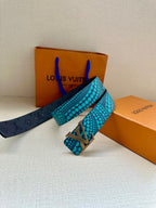 Louis Vuitton belt with turquoise dot pattern strap and gold LV buckle