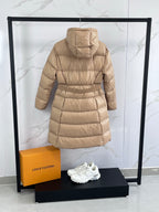 Tan long puffer coat with hood and back view, tied waist belt