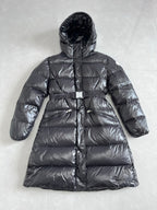 Long hooded puffer jacket with zip front and quilted panels, dark gray exterior