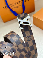 Checkered leather belt with LV logo buckle shown from angled close-up