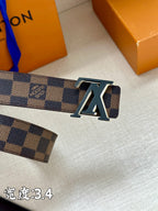 Checkered leather belt front with large LV buckle emblem