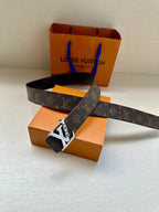 Louis Vuitton belt with monogram strap and large cross buckle, dark brown