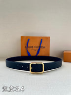 Louis Vuitton leather belt, dark blue with gold-tone rectangular buckle and keeper
