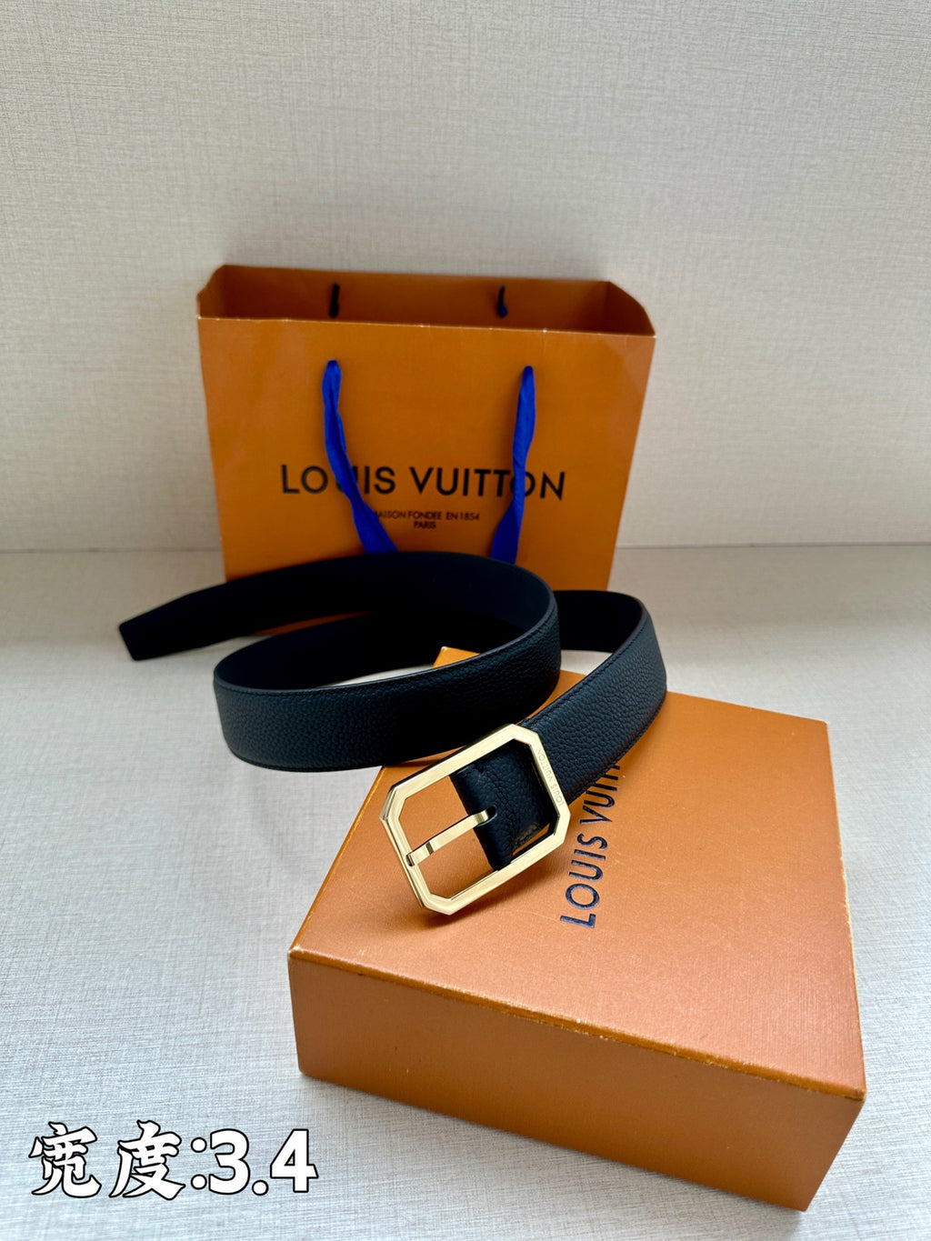 Louis Vuitton leather belt, dark blue strap with metal buckle and adjustable holes