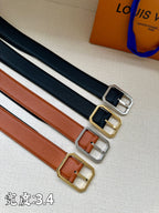 Louis Vuitton belt set: dark blue and tan leather straps with silver and gold buckles