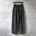 Balenciaga dark pants with elastic waistband and drawstring, wide-leg