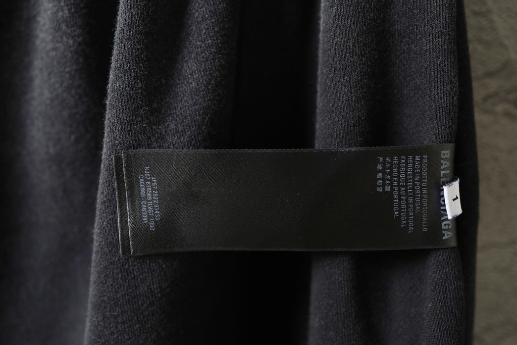Balenciaga dark pants inner label on side seam