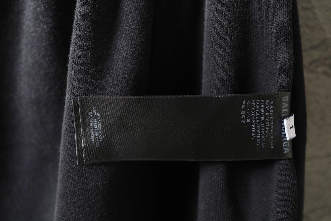 Balenciaga dark pants inner label on side seam